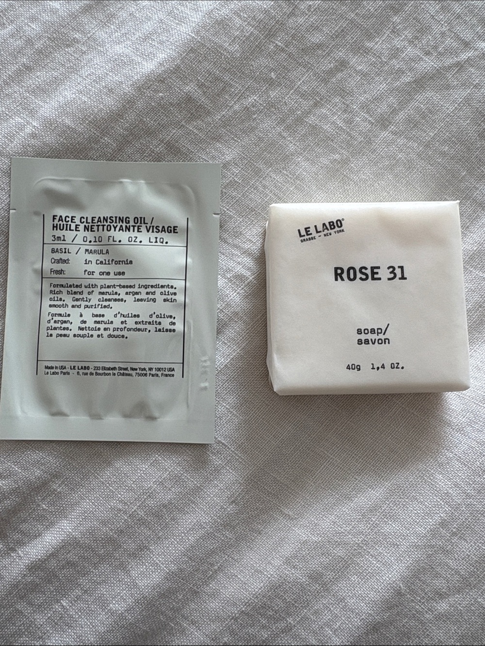 Le Labo Rose 31 Soap – White 40g. And a face cleansing oil packette.
